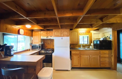 Oxford Cottage | Quaint and cozy Maine cottage on quiet Hogan Pond with large sandy beach!
