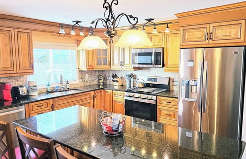 Greenwich House | Quaint duplex with private yard. Walk to beach, dining, & shopping!
