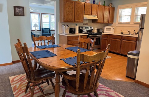 Tawas City House | Quaint Family "Up North" Cottage on Tawas Lake - catch fish, relax, sunsets!