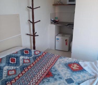 Sao Bento do Sapucai Apartment | Quarto Aconchegante