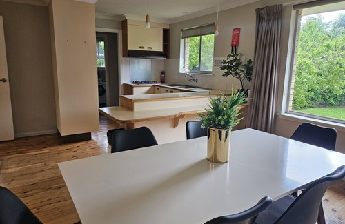 Orange House | Quiet-2-bedroom residential home with covered parkn