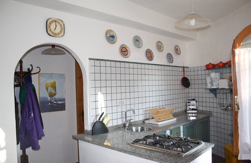 Sa Rocca Tunda Apartment | Quiet Ground Floor Apartment 20 meters from the Sea with Private Garden & BBQ