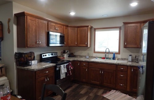 Oakes House | Quiet neighborhood. Walk to downtown. Easy Access. Clean and new.