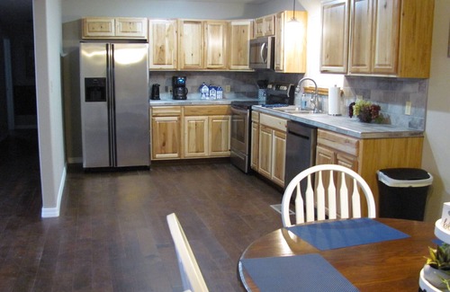 Atkins House | Quiet neighborhood with covered patio & plenty of space for family and friends!