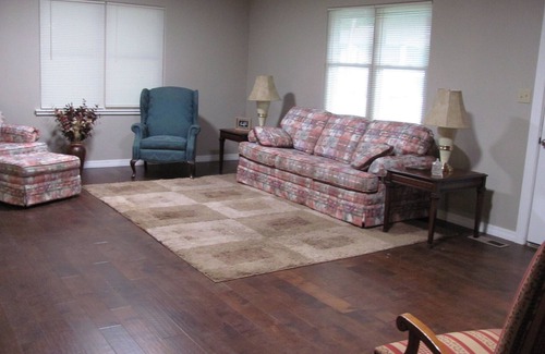 Atkins House | Quiet neighborhood with covered patio & plenty of space for family and friends!
