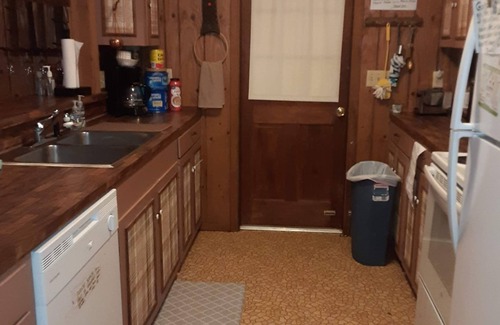 Diamondhead House | Quiet, secluded in wooded neighborhood 4 bedroom, 2 bath and screened porch