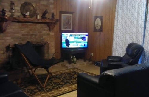 Diamondhead House | Quiet, secluded in wooded neighborhood 4 bedroom, 2 bath and screened porch