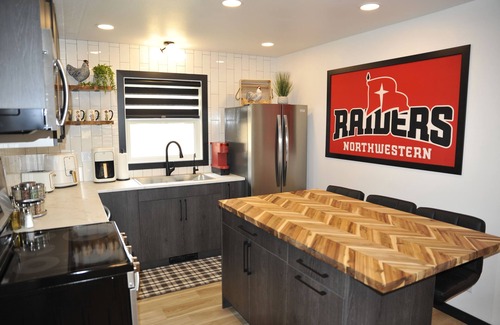 Orange City House | Raider Roost-Putting Green/Fire Pit/Game Room Close to NWC & Downtown!