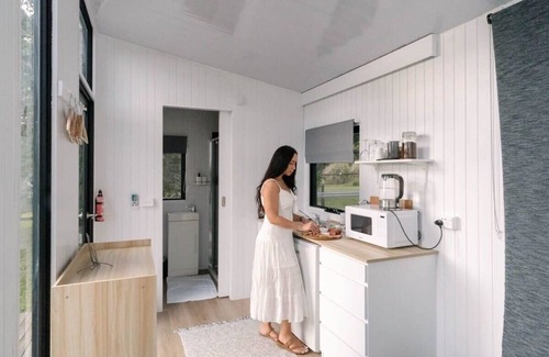 Kuranda House | Rainforest Sunsets by Tiny Away