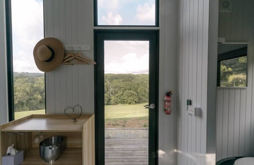 Kuranda House | Rainforest Sunsets by Tiny Away
