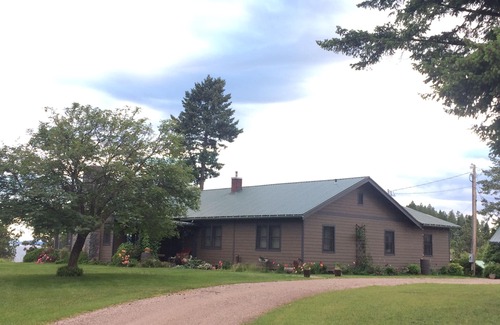 Woods Bay House | RARE FIND: Over 200' of Flathead Lake Lakefront with distinctive home