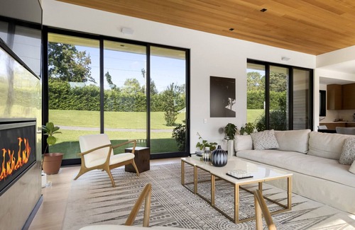 Shinnecock Hills House | Recently constructed modern-style home with a gated entrance, private pool,.