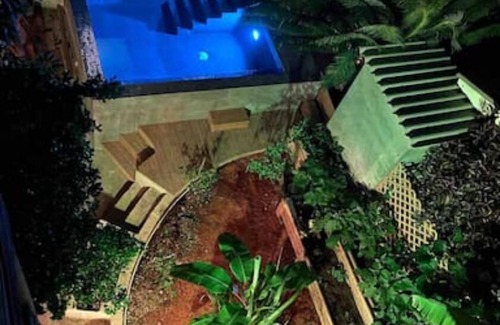 Koralengebied Cottage | Red Oasis at Otro Curaçao in Historic Otrobanda