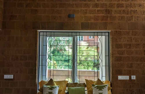 Virarajendrapet Villa | Red Rock Villa: Your Ultimate Holiday Home in the Heart of Coorg