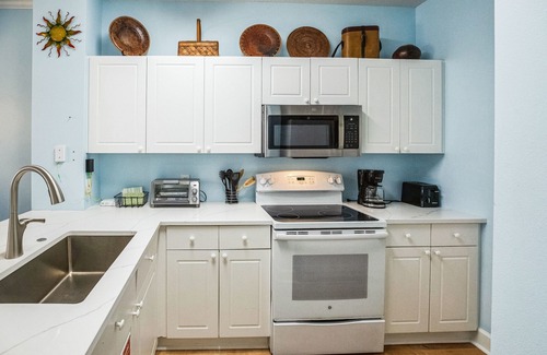 Frangista Beach Condo | Refreshed & remodeled charming 2-bedroom condo 80 steps away from Miramar Beach