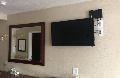 Harrisonville Hotel | Relax and Recharge in Knights Inn Harrisonville! Free Parking, Pets Allowed