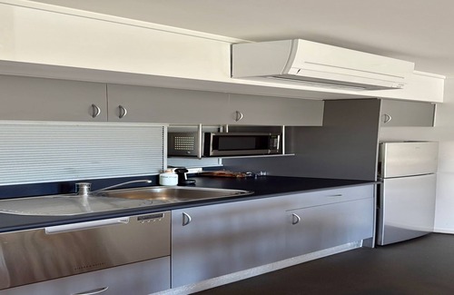 Batehaven Apartment | Relax by the Pool in This Stylish Batehaven Stay