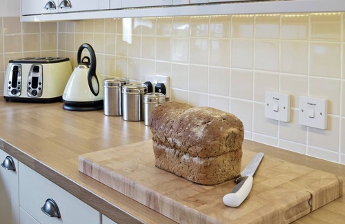 Munslow Cottage | Relax in front of the woodburner in this single-storey barn conversion.