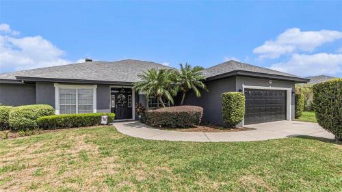 Lakeland House | Relax in Heated Saltwater Pool Screened Lanai