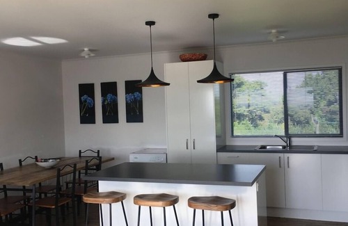 Matauri Bay House | Relax while taking in the expansive sea views