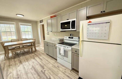 Sloans Valley Cabin | Relax with family and friends in this peaceful cabin right off the boat ramp!