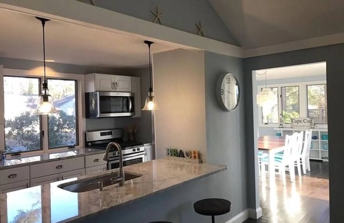 Mews Village House | Renovated Home with heated pool near the beach! Fenced in yard +pet friendly