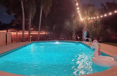 Forest City House | Resort-style home with a Heated Pool and a Huge Gated Yard