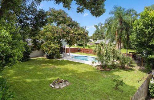 Forest City House | Resort-style home with a Heated Pool and a Huge Gated Yard