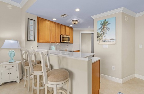 Cape Harbour Condo | Resort-style living high above the beautiful Cape Harbour Marina!