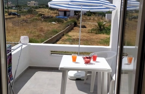 Milatos Beach Apartment | Right on the beach, panoramic sea view, mountain view, family friendly