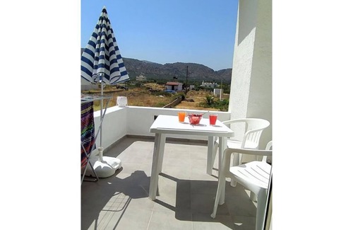Milatos Beach Apartment | Right on the beach, panoramic sea view, mountain view, family friendly