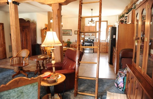 Shell Rock House | River View From Historic Mill's 2nd Floor. Rustic Timber-frame Construction