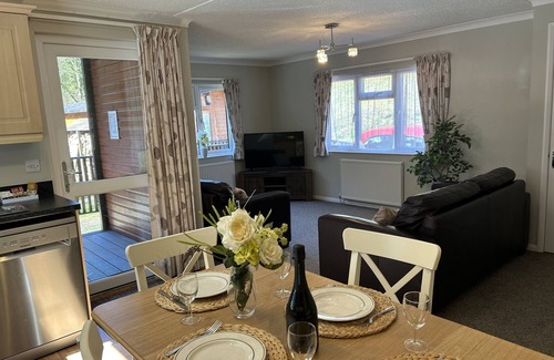 Lynton Cabin | Riverside 2 Bed Lodge with Hot Tub. Walk to Lynton Centre. Free Parking.
