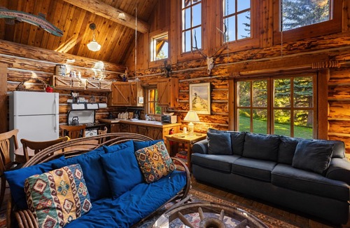 Livingston House | Riverside log cabin, pool, pickle ball court, ultimate mountain experience