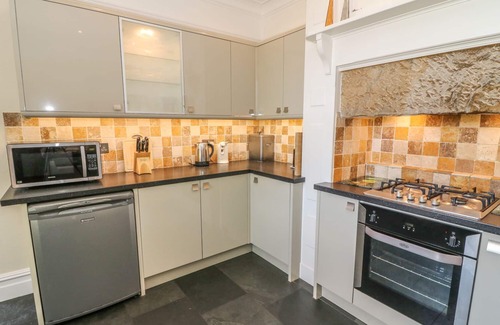 Cark Cottage | RIVERSIDE VIEW, pet friendly, with a garden in Cark In Cartmel