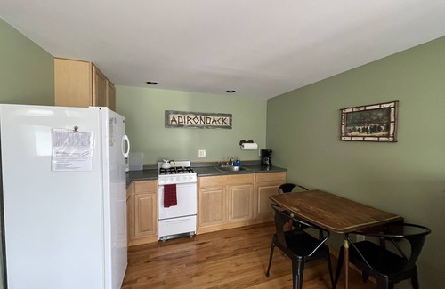 Old Forge Cottage | Romantic, Large Studio with Rustic Queen Size Bed and Decor