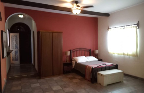 La Ribera Bed & Breakfast | Room #6 Master with one king size bed, one double bed & one double bunk bed