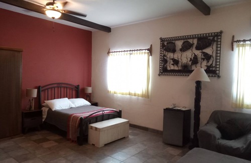 La Ribera Bed & Breakfast | Room #6 Master with one king size bed, one double bed & one double bunk bed