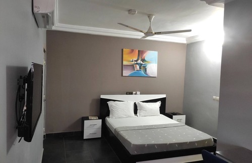 Lome House | Room in Guest Room - Deluxe Double Bed in Royal Blue Guest House and Bar 01