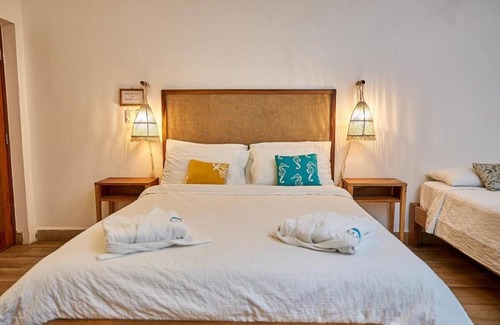 Las Penitas House | Room in Lodge - Papaya 1-triple Room