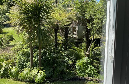 Stanmore Bay Cottage | Rosie's cottage in Stanmore Bay , a short walk to beach with a great seaview.