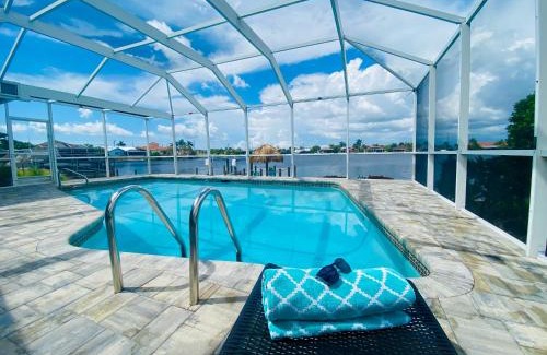Eight Lakes House | Ruby's Lake Retreat - Heated Pool, Tiki Hut & Lake Views