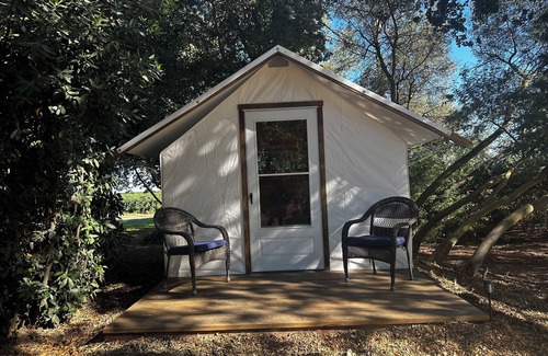 Walnut Grove Cabin | Rustic Cabin + Glamping Tent at Vineyard Retreat on Grand Island in Delta