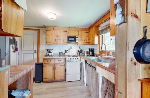 Palermo House | Rustic dog-friendly waterfront home with screened porch, dock, firepit, 2 kayaks