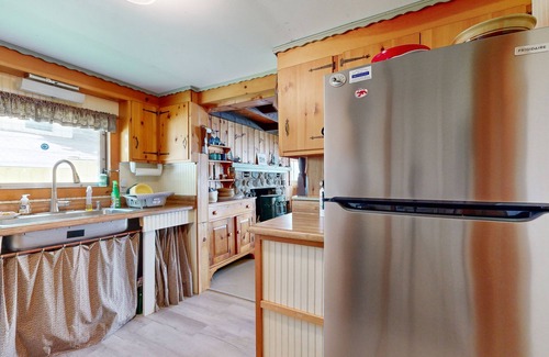Palermo House | Rustic dog-friendly waterfront home with screened porch, dock, firepit, 2 kayaks
