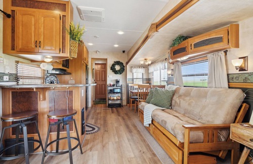 Langworthy RV Rental | Rustic Retreat Camper - on Silver Lake in Delhi. Pet Friendly!