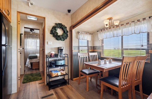 Langworthy RV Rental | Rustic Retreat Camper - on Silver Lake in Delhi. Pet Friendly!