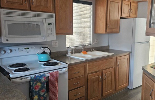 Bullhead City House | RV Resort Park Model - Bullhead City. View Colorada River and Casino Lights.