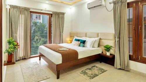 Krishnarajapura Apartment | SaffronStays Suki Suites, Executive