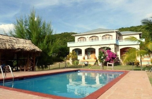 Treasure Beach Villa | Sandy Rose Villa - Your tropical paradise getaway